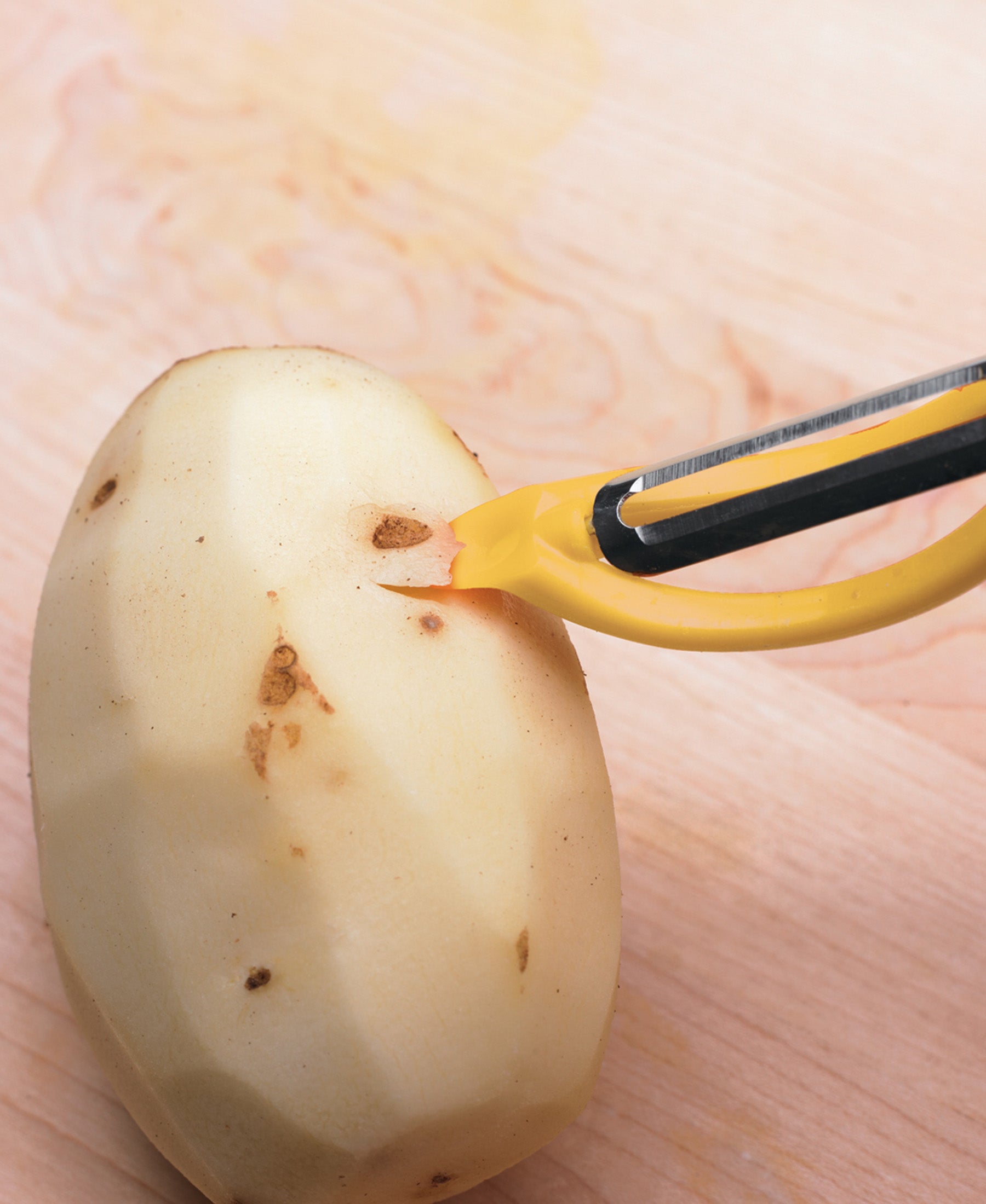 Progressive potato clearance peeler